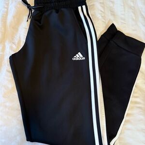 Adidas Women’s Black Joggers with White Stripes